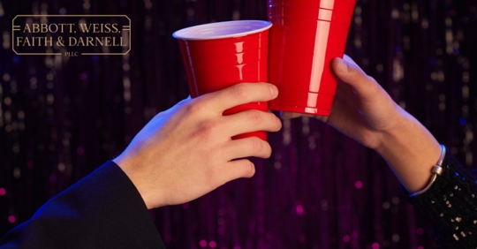 teens' hands holding alcohol